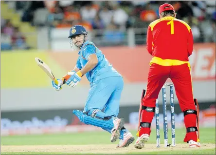  ?? — THE ASSOCIATED PRESS ?? India’s Suresh Raina plays a shot behind Zimbabwe wicket-keeper Brendon Taylor, right, during their Cricket World Cup Pool B match Saturday in Auckland, New Zealand.