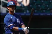  ?? CHRISTIAN PETERSEN — GETTY IMAGES, FILE ?? Khris Davis joined the Rangers after hitting 158 homers and driving in 418runs over the past five seasons with the A’s. He slugged a career-high 48 home runs in 2018.