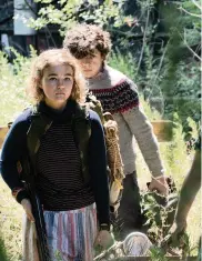  ??  ?? From left, Millicent Simmonds, Noah Jupe and Emil horror sequel ‘A Quiet Place Part II.’