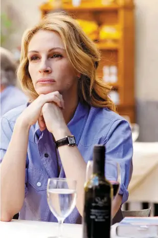  ??  ?? Solo dining: Julia Roberts in Eat Pray
Love. Eating alone means no small talk, no shared dessert and best of all, no split bills