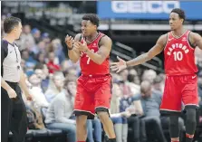  ?? LM OTERO/THE ASSOCIATED PRESS ?? Toronto Raptors guards Kyle Lowry, left, and DeMar DeRozan question a call while playing against the Dallas Mavericks on Tuesday. The Raptors lost to the Mavericks 98-93.
