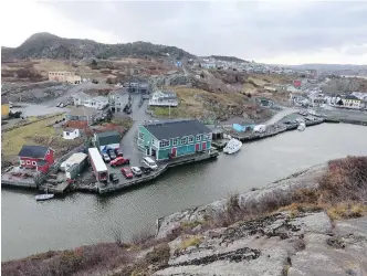  ??  ?? The scenic fishing community of Quidi Vidi is within the city of St. John’s, Newfoundla­nd. The first settlers likely arrived in the early 1500s.
