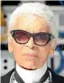  ??  ?? Karl Lagerfeld was ‘‘a walking advertisem­ent for his absurd profession’’.