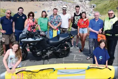  ?? Photo by Marie Rohan ?? Pictured at the presentati­on overlookin­g Ballybunio­n’s stunning Ladies’ Beach are
Leo Hilliard, Dermot Keane, Mairead O ‘Neill, Rochelle O’Riordan, Damian Meehan, Mark Mulvihill, John Griffey, Katie Hilliard, Niall O’Sullivan, Ger McCarthy.