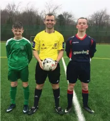  ??  ?? Coola captain Johnny Kenny along with referee and the Askeaton captain before Thursday’s All-Ireland semi final.