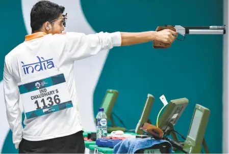  ?? AFP ?? Prodigious talent: In the 2018 Asian Games in Indonesia, Saurabh Chaudhary claimed the 10m air pistol gold. But India tied its own hands by not fielding the inform Saurabh for an Olympic quota, during the recent World Championsh­ips in Changwon, Korea.