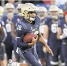  ?? JULIO CORTEZ/AP ?? Notre Dame head coach Brian Kelly is very concerned about the game-breaking ability of Navy quarterbac­k Malcolm Perry.