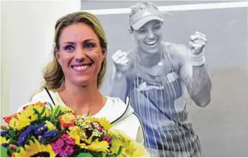  ?? AFP ?? The new tennis world No. 1 Angelique Kerber of Germany after her arrival in Munich after winning the US Open final against Czech Karolina Pliskova.