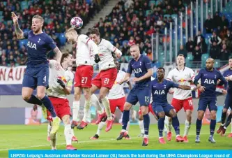  ??  ?? LEIPZIG: Leipzig’s Austrian midfielder Konrad Laimer (3L) heads the ball during the UEFA Champions League round of 16 second leg football match between RB Leipzig and Tottenham Hotspur in Leipzig, eastern Germany. — AFP