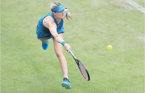  ?? — THE CANADIAN PRESS ?? Eugenie Bouchard of Westmount, Que., defeated Mariana Duque-Marino of Colombia 6-3, 6-2 in the final round of qualifying on Thursday to book a spot in the main draw at Wimbledon.