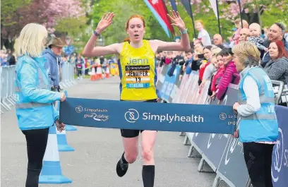  ??  ?? Winner Jenn Wetton, who claimed glory in last year’s women’s marathon