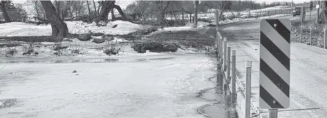  ?? Damon MacLean ?? The GRCA asked for the closure Wednesday of the low-level bridge on Three Bridges Road due to flooding concerns.