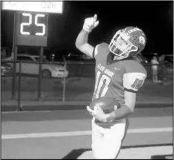  ?? Photo by Gerren Smith ?? GIVING PRAISES: Noah Wright (10) acknowledg­es praises to the all mighty God after making a touchdown reception against West Fork Friday in the second round of the Class 3A state football playoffs at Beaver Stadium.