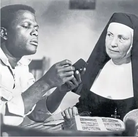  ??  ?? OSCAR: Sidney Poitier and Lilia Skala in The Lilies Of The Field.