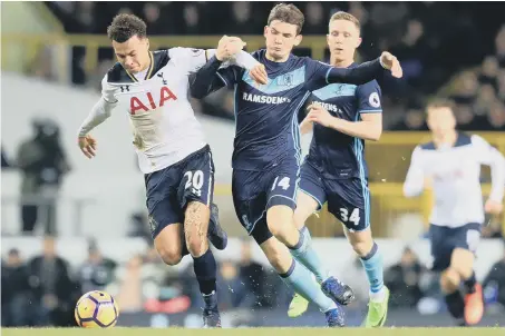  ??  ?? Boro’s Marten de Roon gives chase to Tottenham star Dele Alli in Saturday’s 1-0 defeat at White Hart Lane