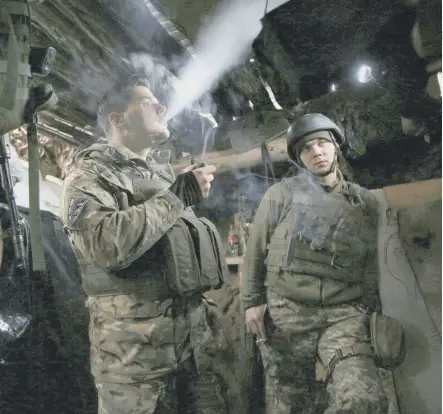  ??  ?? 0 Ukrainian soldiers in a dugout on the front line, near Avdiivka in the Donetsk region