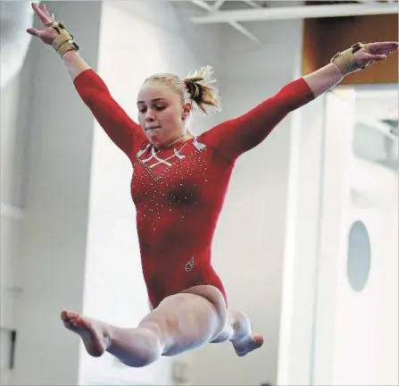  ?? CLIFFORD SKARSTEDT EXAMINER ?? Juliette Abrioux, 13, competes as Kawartha Gymnastics hosts the Gymnastics Ontario Meet Saturday at the Sport and Wellness Centre.