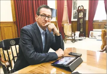  ?? Dan Haar / Hearst Connecticu­t Media ?? Gov. Dannel P. Malloy in his office in Hartford late last month.