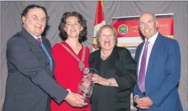  ?? (Pic: Brian Lougheed) ?? Tadhg O’Donovan and Helen Hutton accepting the Northern Division award on behalf of Fermoy Community Pre-School Ltd at the 2022 Mayor’s Community Awards which were held in Cork County Hall, from Mayor of the County of Cork, Cllr Gillian Coughlan in the presence of Tim Lucey, Chief Executive, Cork County Council.