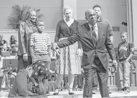  ?? Michael Minasi ?? Kirbyjon Caldwell, senior pastor of Windsor Village United Methodist Church, uses volunteers to drive home points of his tribute during the Martin Luther King, Jr. Day celebratio­n on Jan. 15, at The Woodlands United Methodist Church.