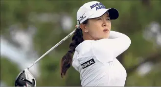  ?? Mike Ehrmann / Getty Images ?? Women’s PGA champion Sei Young Kim of Korea, when asked which man she would want as a partner in a mixed PGA/LPGA tournament, replied in English, “Everyone.”