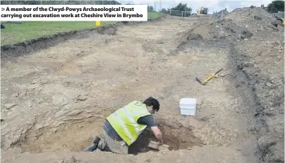  ??  ?? &gt; A member of the Clwyd-Powys Archaeolog­ical Trust carrying out excavation work at Cheshire View in Brymbo
