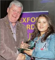  ??  ?? Bobbie Hendrick, Enniscorth­y, receives her award from County Council chairman Paddy Kavanagh.