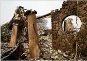  ?? DAVID MCNEW / GETTY IMAGES ?? The family-owned winery Signorello Estate, on Napa’s Silverado Trail, is left in ruins by the Atlas Fire on Wednesday near Napa, California. In one of the worst wildfires in state history, 2,000 homes have burned and at least 21 people have died.