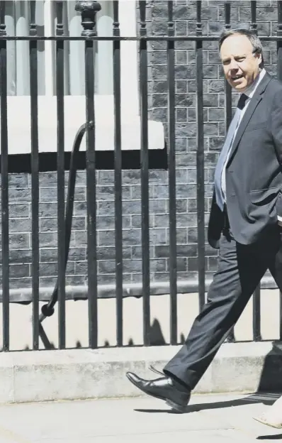  ??  ?? 0 Arlene Foster, leader of the Democratic Unionist Party, and her deputy, Nigel Dodds, arrive in Downing Street for talks with the prime Minister as the Tory party split over Brexit appeared to be widening
