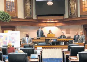  ?? TOM DAVIES/AP ?? Indiana state Sen. Eric Koch, right, R-Bedford, speaks during debate about the Republican-backed congressio­nal and legislativ­e redistrict­ing plan with Sen. Greg Taylor, left, D-Indianapol­is, at the Indiana Statehouse on Thursday.