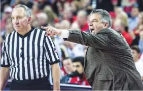  ?? JOHN PAUL VAN WERT/UGA PHOTO ?? Auburn third-year basketball coach Bruce Pearl will be looking for his 19th win this season when the Tigers take on Missouri tonight in an SEC tournament first-round matchup.