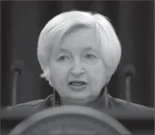  ?? The Associated Press ?? YELLEN: Federal Reserve Chair Janet Yellen speaks on June 14 in Washington to announce the Federal Open Market Committee decision on interest rates following a two-day meeting. On Wednesday, the Federal Reserve releases minutes from its June meeting,...