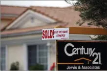  ?? FILE PHOTO ?? A real estate sign is seen outside a home.