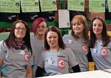  ?? ?? Women volunteers at CAMRA’s National Winter Ale Festival