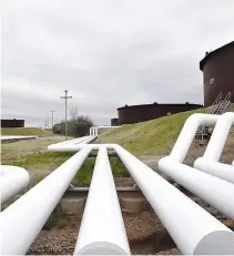  ??  ?? PIPELINES run to Enbridge, Inc.’s oil storage tanks in Oklahoma, March 24, 2016.