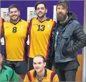  ??  ?? TEAM MAN: Harry Denson, right, jumped into a Horsham Volleyball team photo late last year.