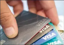  ??  ?? This file photo shows Visa credit cards in New Orleans. Almost all of us make a credit mistake from time to time, but some of them have a lot of
staying power. (AP)