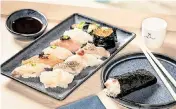  ?? MELISSA HOM ?? Bondi’s omakase experience, which includes 11 pieces of fish and a handroll, costs $75 per person.