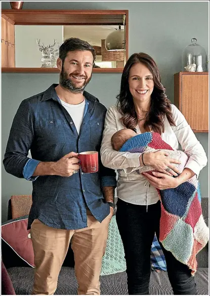  ?? STUFF ?? Prime Minister Jacinda Ardern, pictured here at home with partner Clarke Gayford and daughter Neve, faces an immediate crisis on her return to work.