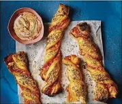  ?? CRAIG ROBERTSON ?? Preserved lemon, feta and za’atar twists from the “Taste & Flavour” cookbook, which is a collection of recipes for people who have lost their taste and smell due to covid-19.