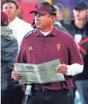  ?? ROB SCHUMACHER/THE REPUBLIC ?? Arizona State head coach Shaun Aguano calls a play against UCLA in the second half Nov. 5 at Sun Devil Stadium.