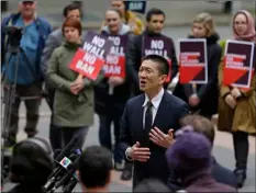  ?? AP PHOTO ?? In this May 15 file photo, Hawaii Attorney General Doug Chin, talks to reporters outside a federal courthouse in Seattle.