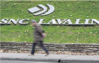  ?? PAUL CHIASSON/THE CANADIAN PRESS FILES ?? SNC-Lavalin Group’s offer to acquire WS Atkins PLC for about $3.5 billion is a “step toward being a more diversifie­d company,” says a Canaccord Genuity analyst.