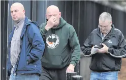  ??  ?? Damien ‘Dee’ Fennell (left) and other members of GARC outside court