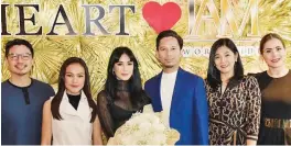  ??  ?? HEART EVANGELIST­A with GMA Artist executive Simoun S. Ferrer and IAM WorldWide executives Aika Uy, Allen Eder, Joanne Manego, and Maritoni Fernandez.