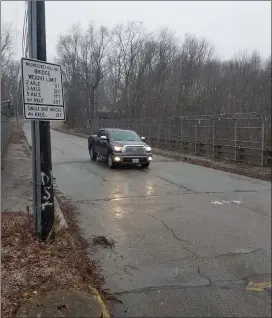  ?? Photo by Joseph B. Nadeau ?? The Woonsocket Hill Road bridge will be closed on Monday.