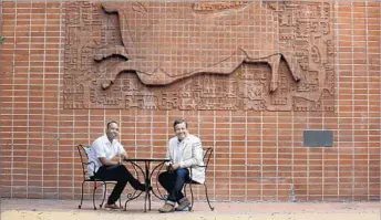  ?? Francine Orr Los Angeles Times ?? MIGUEL SANTANA of the L.A. County Fair Assn., right, recruited Lucas Rivera, former director of Grand Park, to attract young people. “We are speaking to the population of Los Angeles County,” he said.