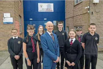  ?? ?? PROUD: Gerry McCluskey with school ambassador­s, from left, Zachary Burkill, Brooke McLean, Maja Pepel, Dylan Duffus, Maja Kirszman, Jake Duncan and Reece Birkett.