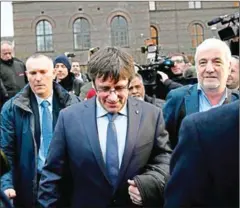  ?? JONATHAN NACKSTRAND/AFP ?? Former Catalan leader Carles Puigdemont leaves the University of Copenhagen after attending a debate on Monday.