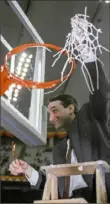  ?? Associated Press ?? The net comes down for Duke coach Mike Krzyzewski two nights later in Indianapol­is, Ind.